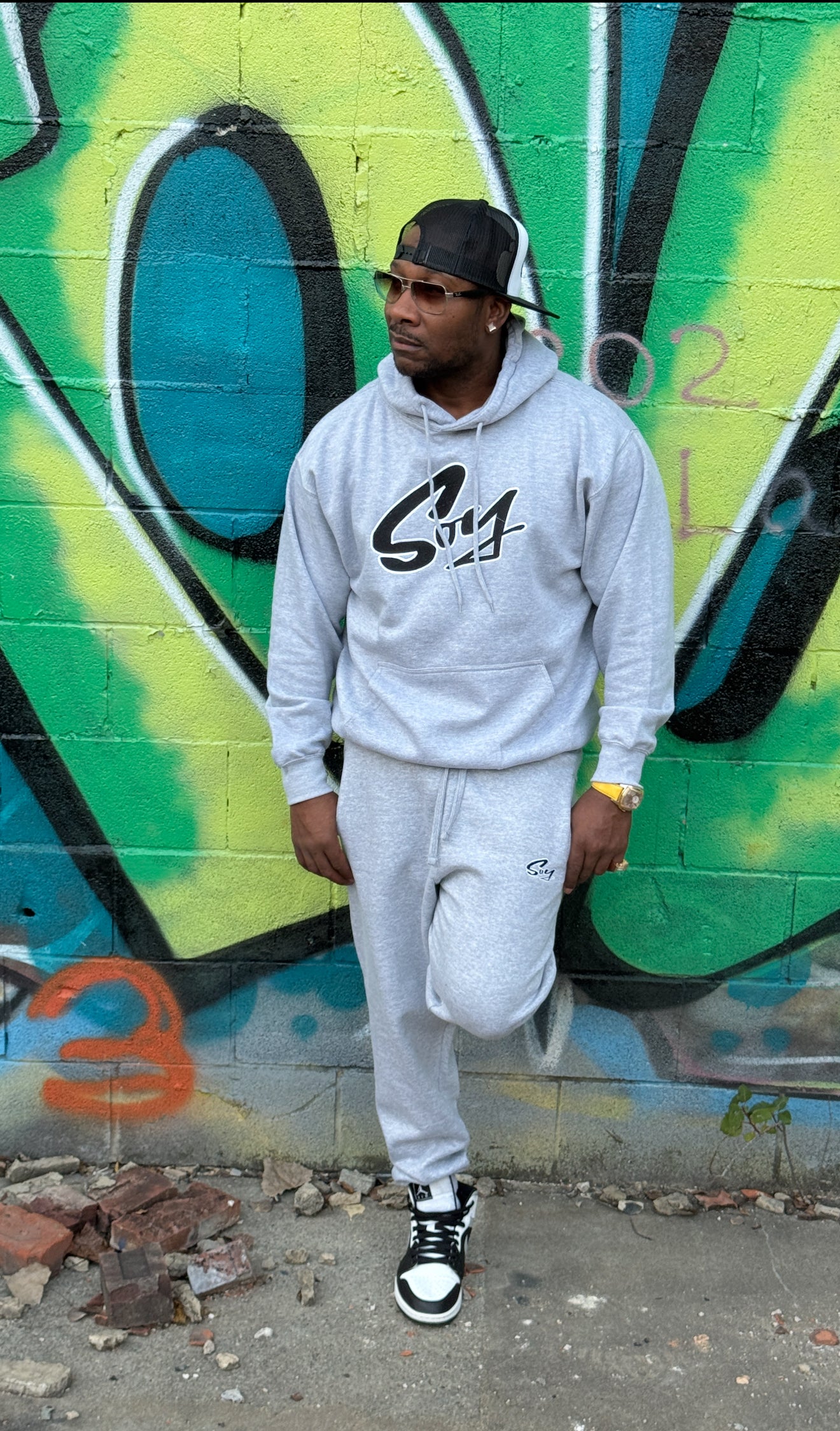 Gray and black with white trim soy hoodie and joggers set